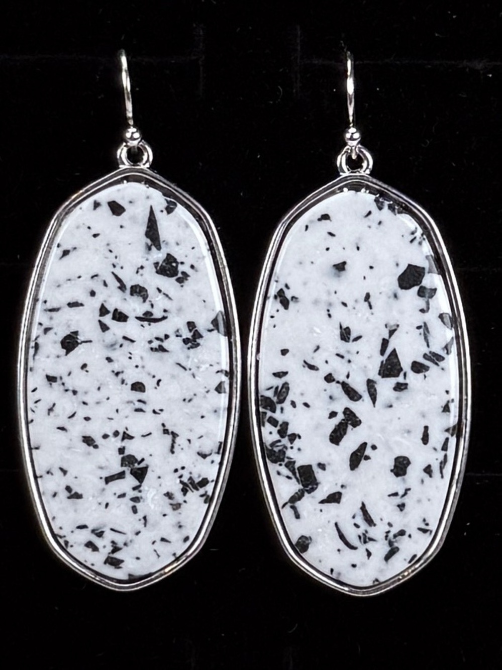 Speckled white and Silvertone weighted pierced earrings